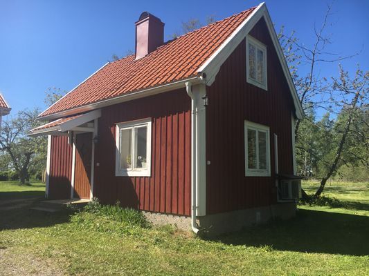 Mysig gårdsstuga på bondgård