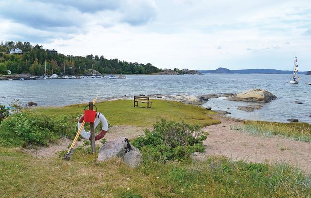 Charmigt timmerhus nära havet - Bild 12