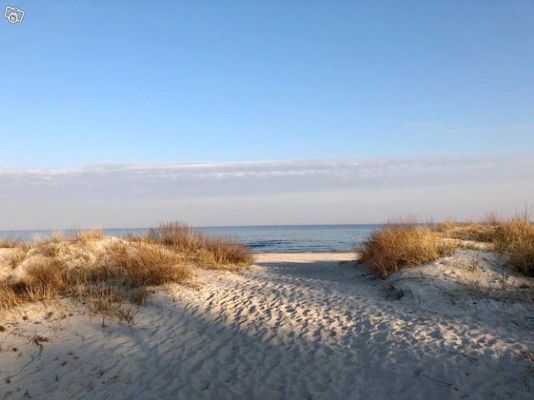 Stuga vid vita stranden - Bild 1