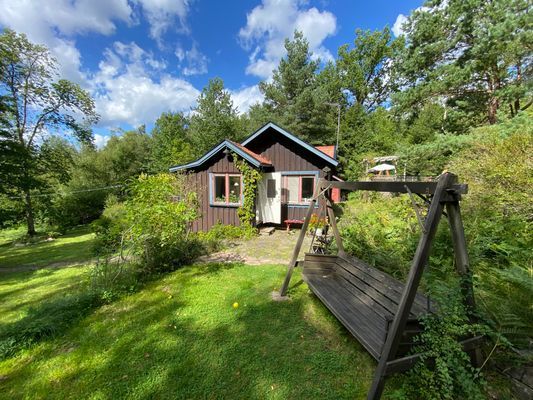 Storstugan och en av två hammockar