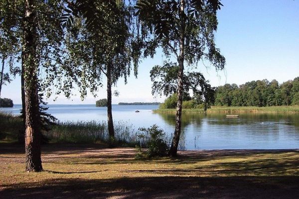 Mysig stuga vid stranden