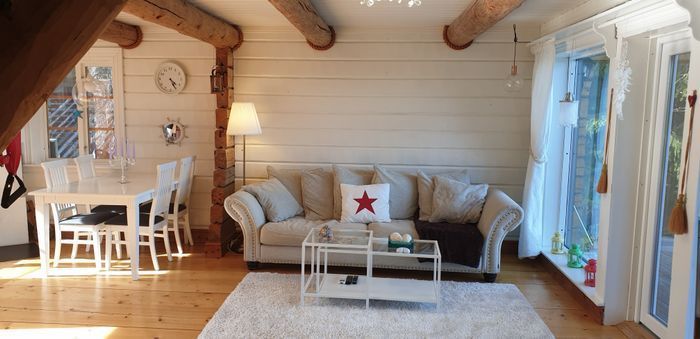 Timmerhus med egen sandstrand och brygga, inkl båt - Bild 8