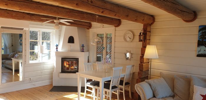 Timmerhus med egen sandstrand och brygga, inkl båt - Bild 10