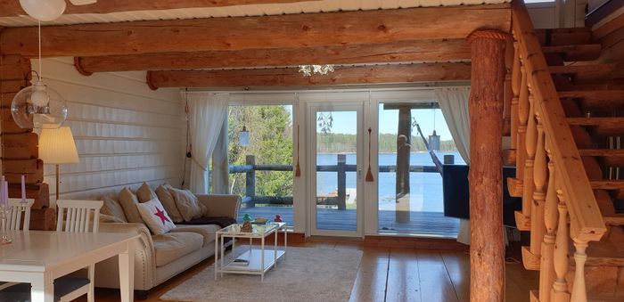 Timmerhus med egen sandstrand och brygga, inkl båt - Bild 15