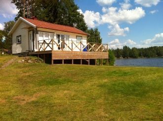 Ett unikt strandläge med sjöutsikt i 3 vädersträck