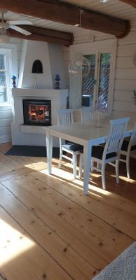 Timmerhus med egen sandstrand och brygga, inkl båt - Bild 24