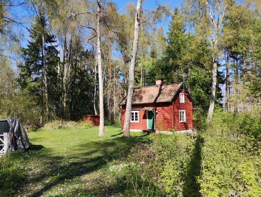 Litet och enkelt torp med utsikt över Granfjärden